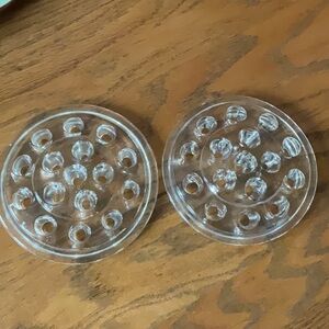 Lot of 2 vintage glass flower frogs.